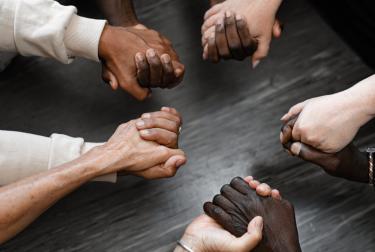 HERO Get involved Group of Students Holding Hands